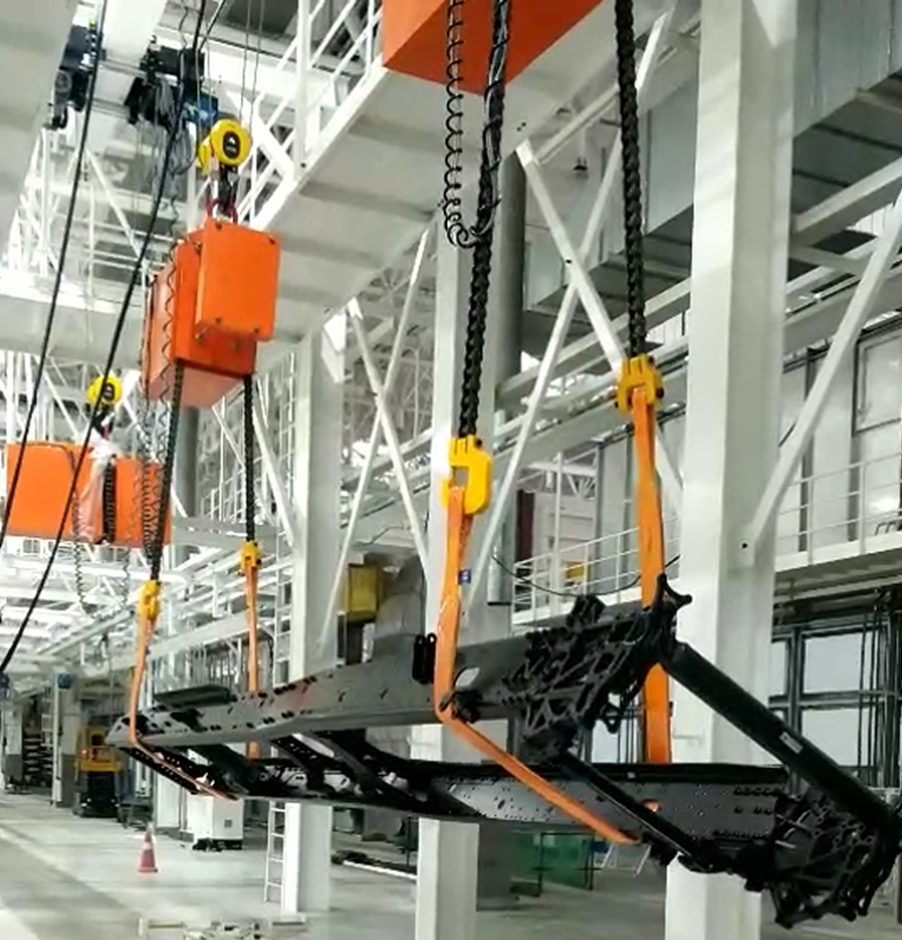 Automotive frame load turning device